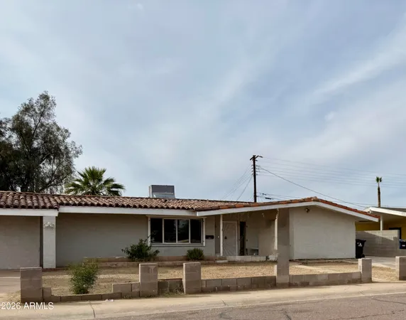 a front view of a house with garage