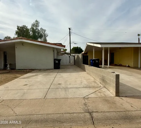 a view of a house with a garage