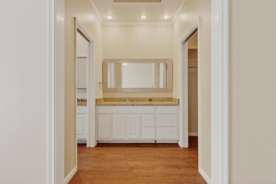 6418 Long Circle Corpus Christi, TX 78413 - Photo 24 of 40 a view of a hallway with bathroom and mirror