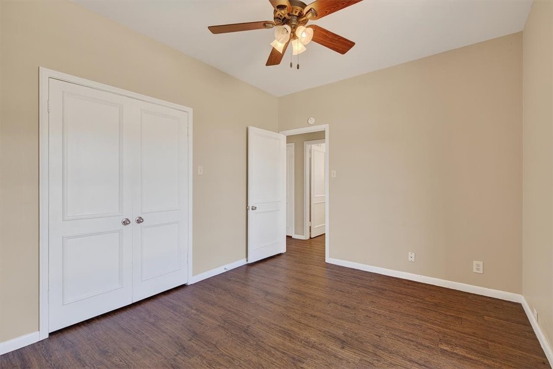 6418 Long Circle Corpus Christi, TX 78413 - Photo 29 of 40 a view of an empty room with wooden floor