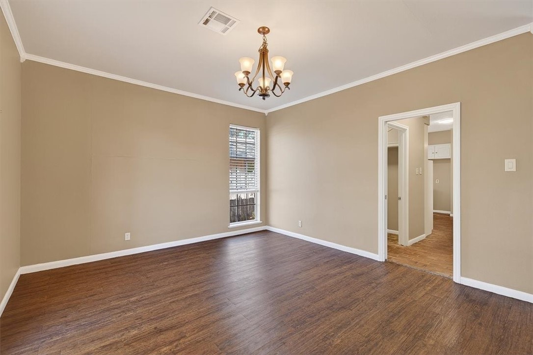 6418 Long Circle Corpus Christi, TX 78413 - Photo 9 of 40 a view of an empty room with wooden floor