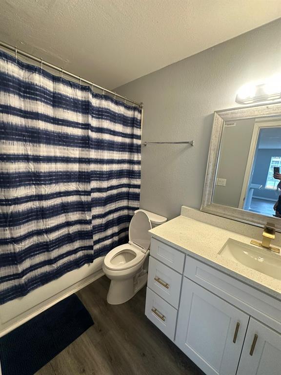 1023 South Hiawassee Road, Unit 4022 Orlando, FL 32835 - Photo 18 of 24 a bathroom with a sink toilet and shower