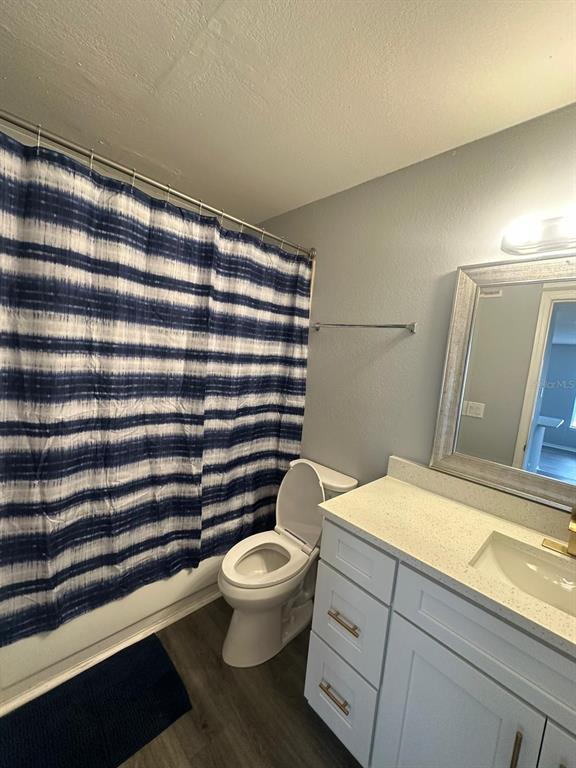 1023 South Hiawassee Road, Unit 4022 Orlando, FL 32835 - Photo 19 of 24 a bathroom with a toilet and a sink