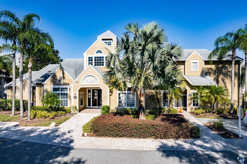 1023 South Hiawassee Road, Unit 4022 Orlando, FL 32835 - Photo 24 of 24 a front view of a house with a yard