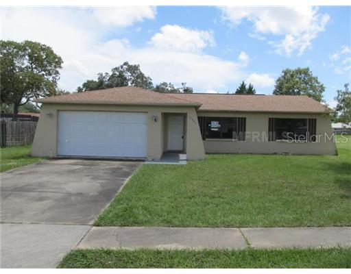 10392 Spring Hill Drive Spring Hill, FL 34608 - Photo 1 of 1 Exterior Front