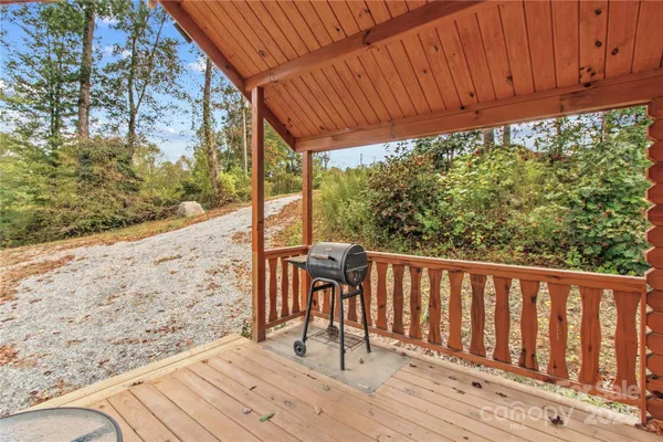 a view of a two chairs in the balcony