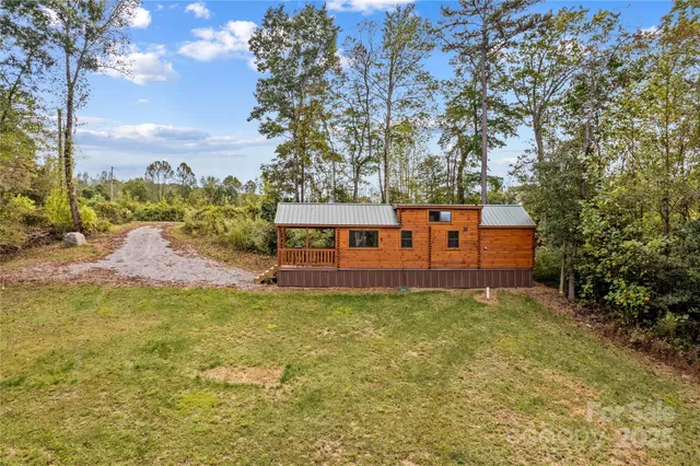 a house with trees in the background