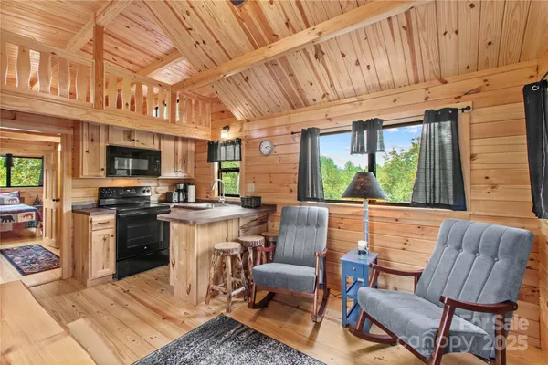 a kitchen with stainless steel appliances granite countertop a stove and a refrigerator
