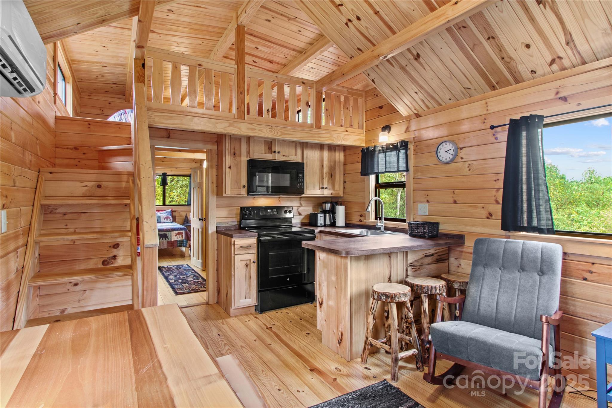 1136 Bauguess Mill Road Traphill, NC 28685 - Photo 7 of 37 a view of a kitchen with furniture and a kitchen