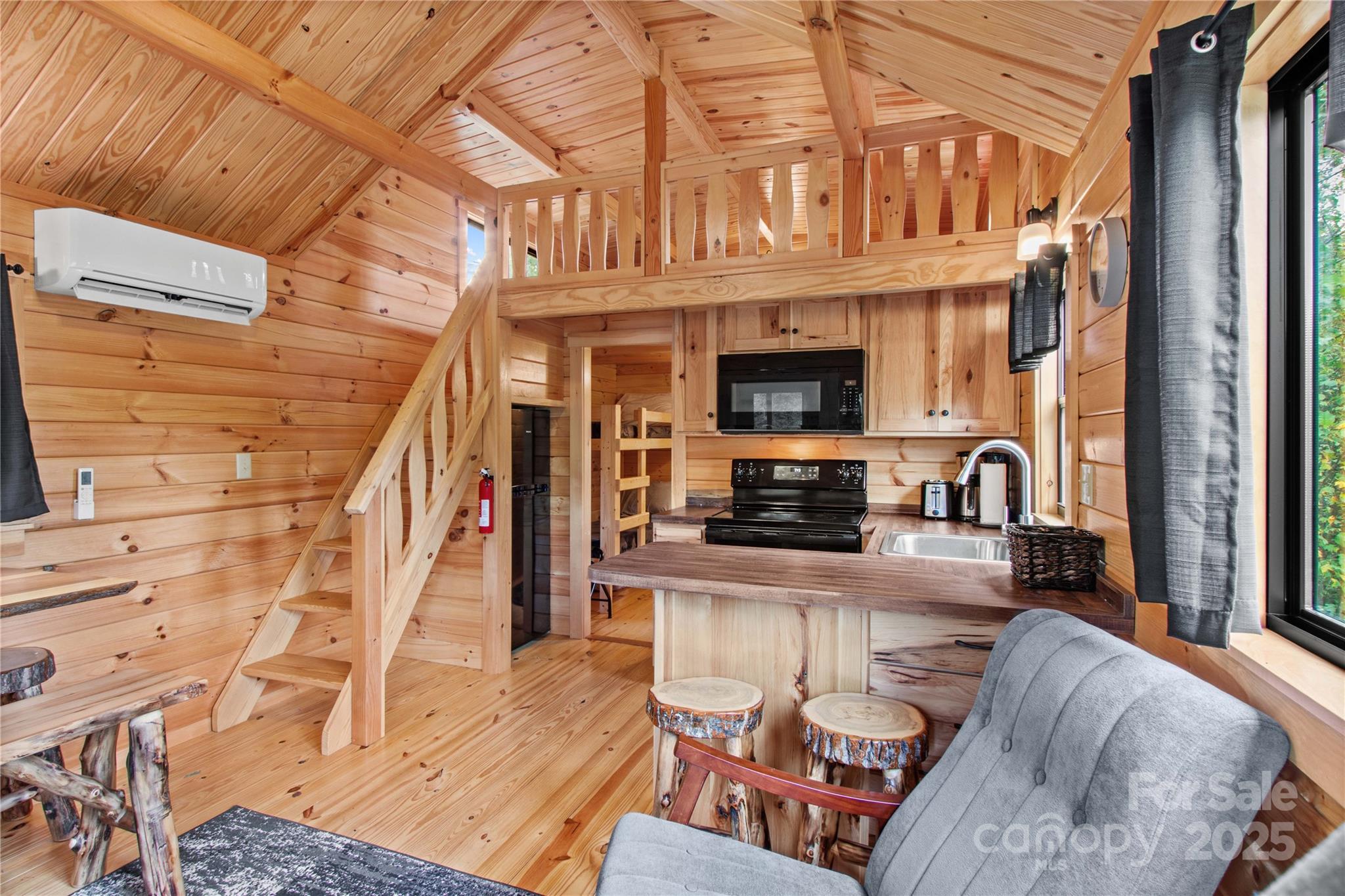 1136 Bauguess Mill Road Traphill, NC 28685 - Photo 8 of 37 a view of a kitchen with furniture and a kitchen view