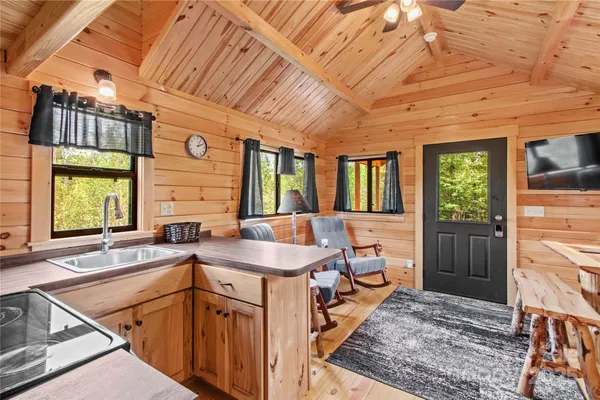 a bathroom with a sink and a large window