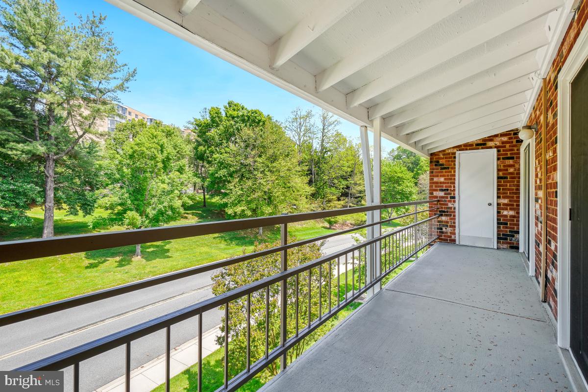 3511 Forest Edge Drive, Unit 173C Silver Spring, MD 20906 - Photo 12 of 52 a view of balcony with yard