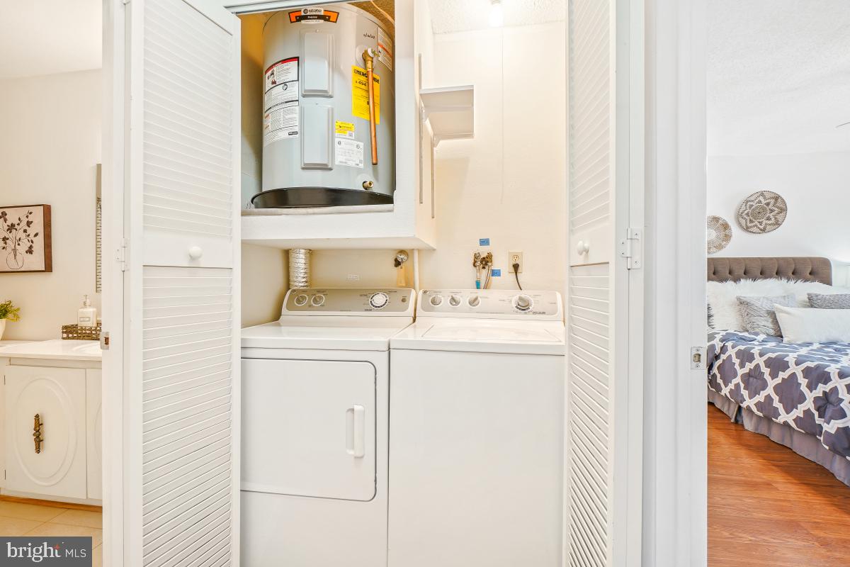 3511 Forest Edge Drive, Unit 173C Silver Spring, MD 20906 - Photo 21 of 52 a bathroom with a sink and a mirror