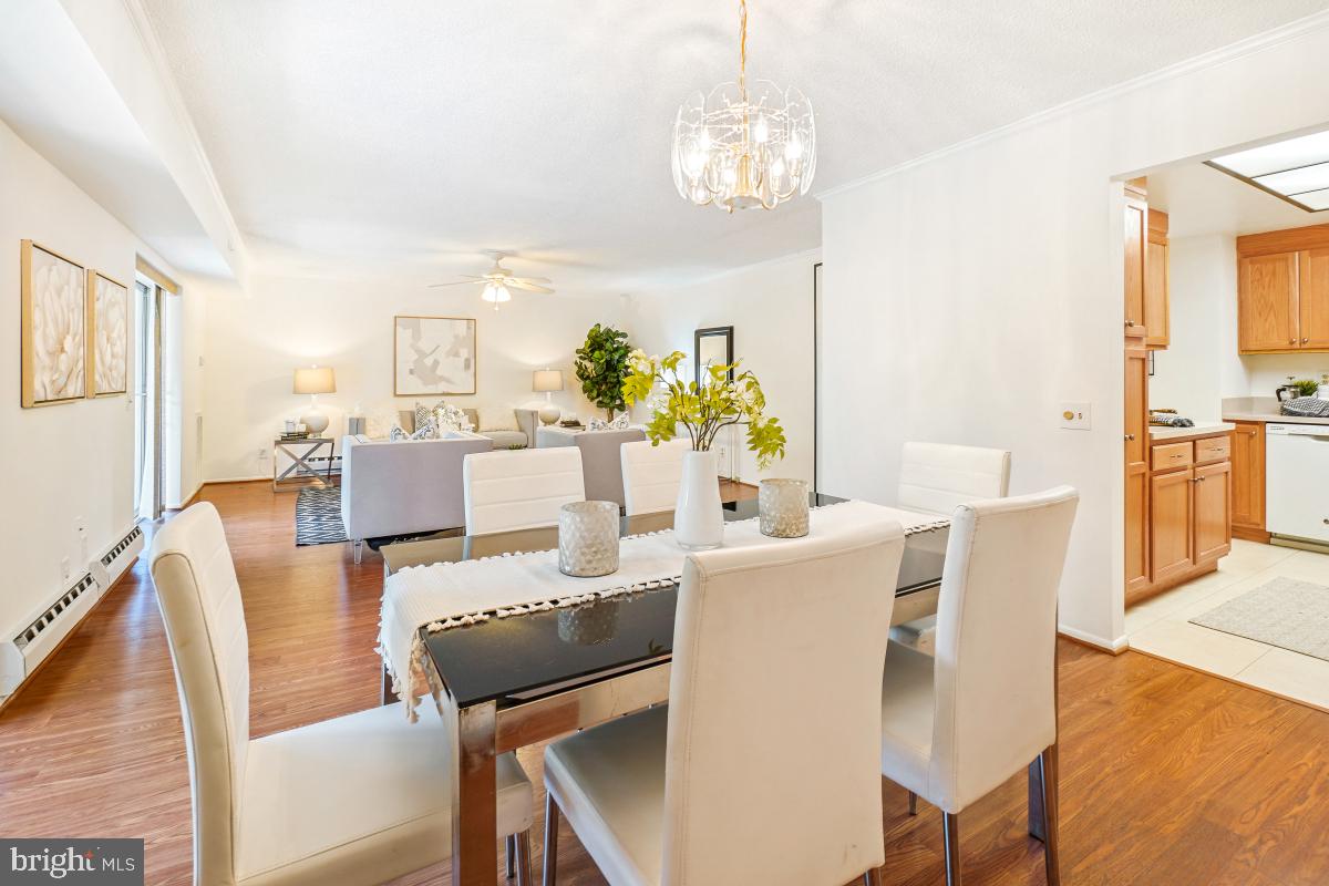 3511 Forest Edge Drive, Unit 173C Silver Spring, MD 20906 - Photo 8 of 52 a view of a dining room with furniture window and outside view