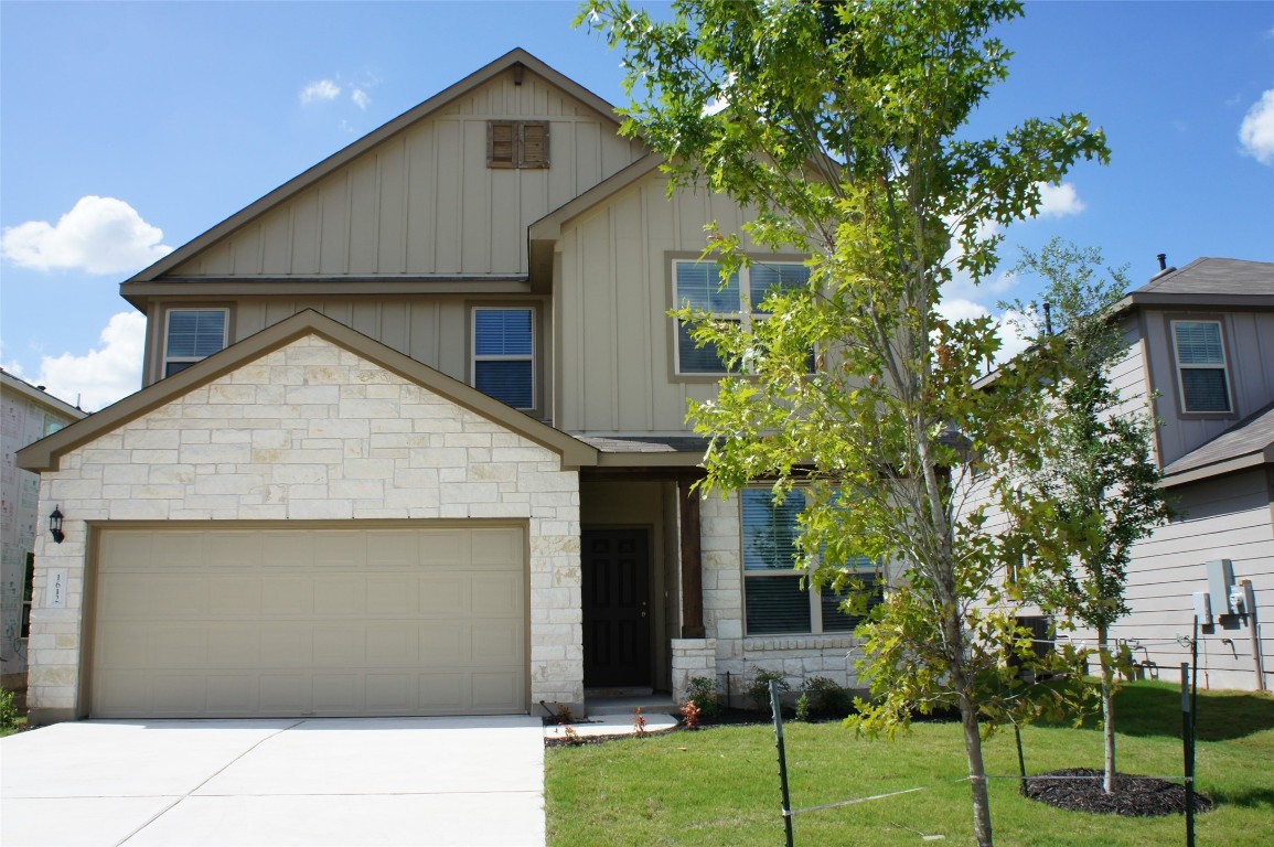 1612 Cliffbrake Way Georgetown, TX 78626 - Photo 2 of 13 a view of house with outdoor space and a parking space