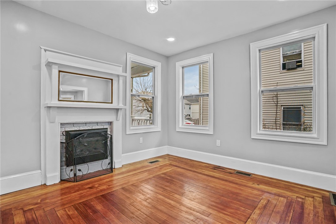 141 Briggs Street Providence, RI 02905 - Photo 7 of 31 Living room with fireplace