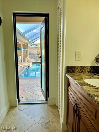 a view of a kitchen from an empty room