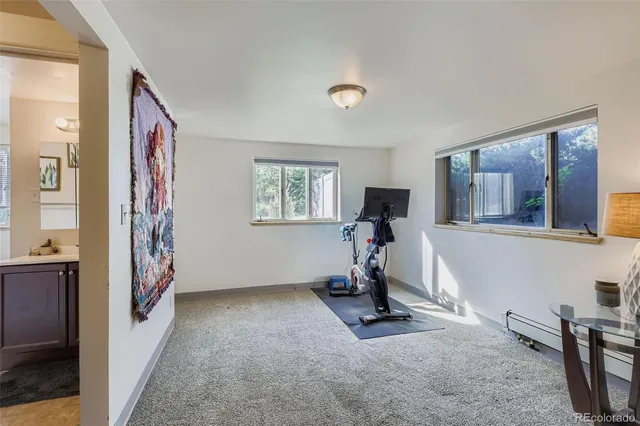 a view of a livingroom with storage & utility room