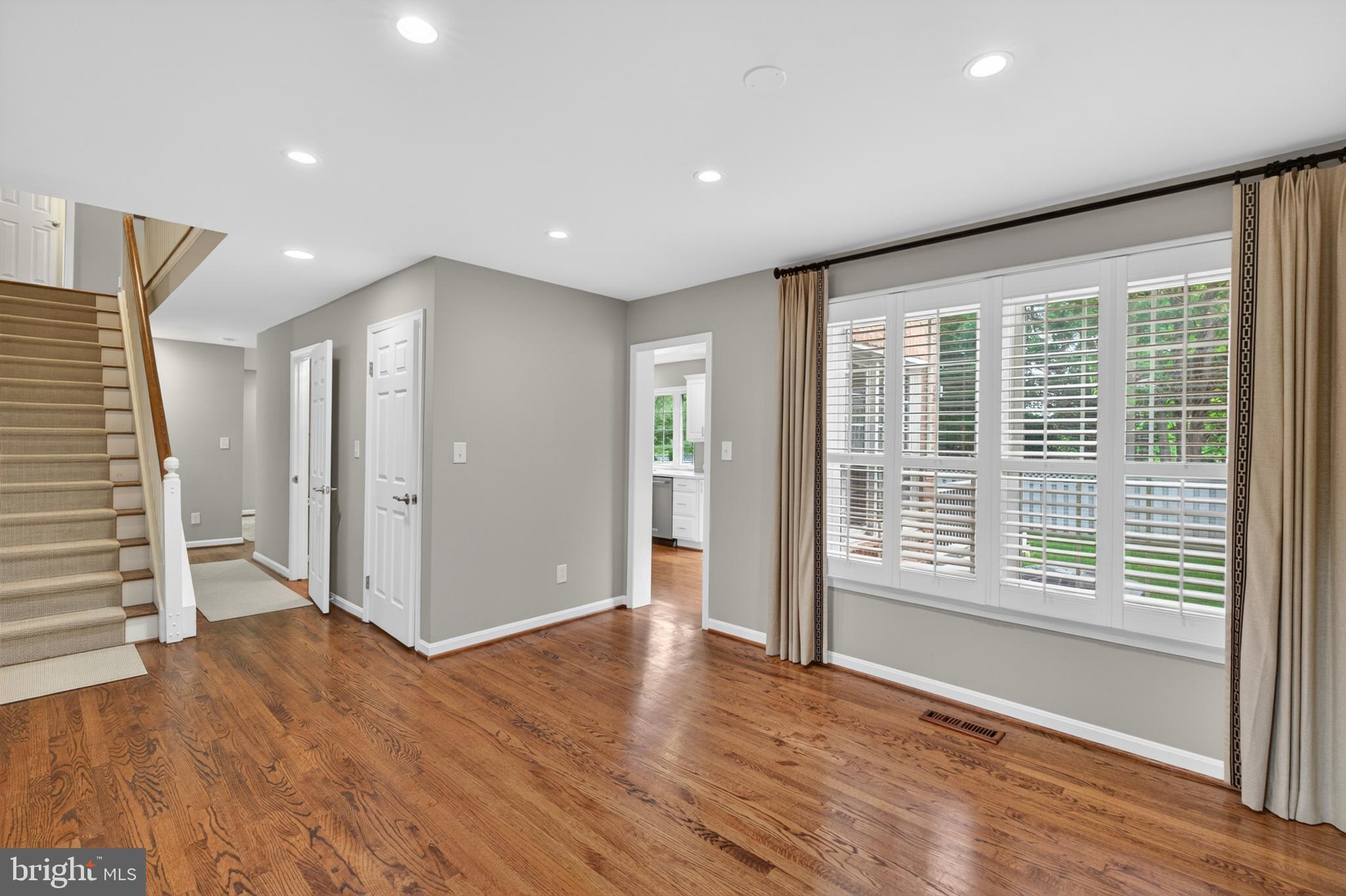 6 Nearfield Road Lutherville-Timonium, MD 21093 - Photo 19 of 71 a view of an empty room with wooden floor and a window