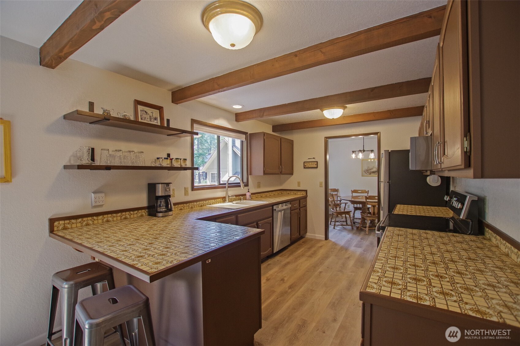 70 Lake Cabins Road Ronald, WA 98940 - Photo 12 of 32 a kitchen with sink cabinets and stove
