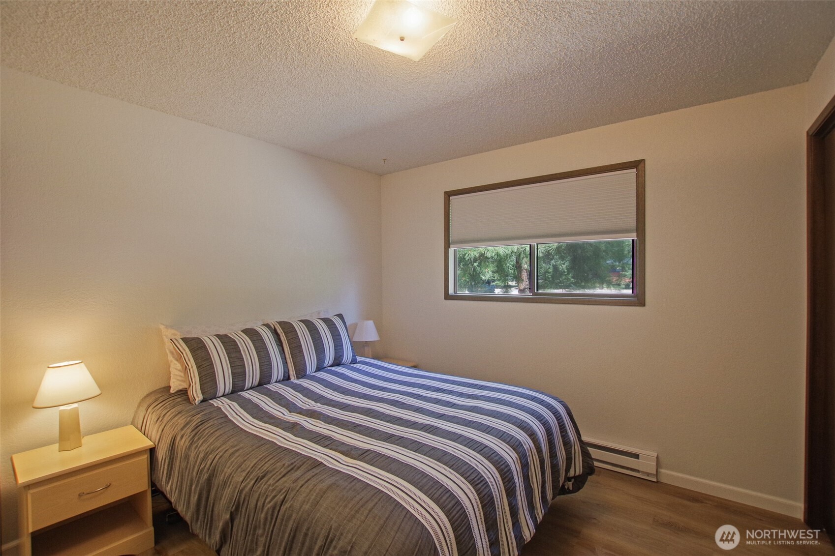 70 Lake Cabins Road Ronald, WA 98940 - Photo 15 of 32 a bedroom with a bed and window