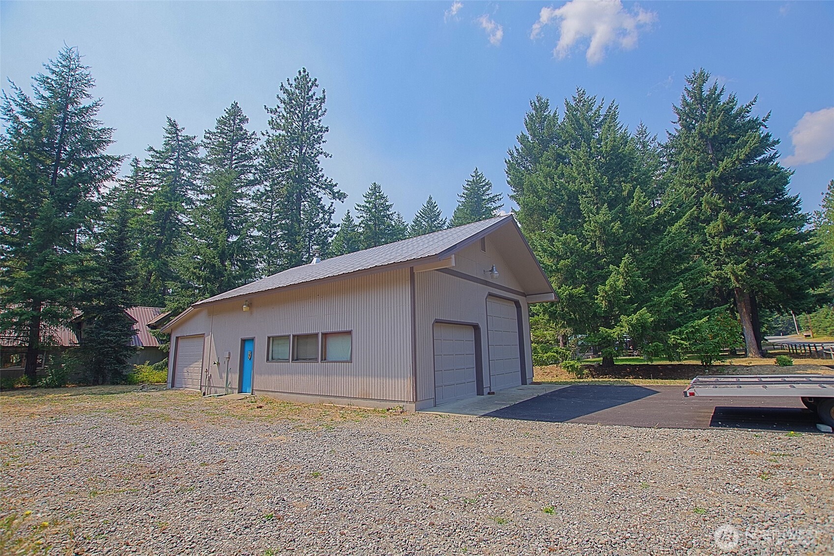 70 Lake Cabins Road Ronald, WA 98940 - Photo 26 of 32 a view of large house with a yard and large trees