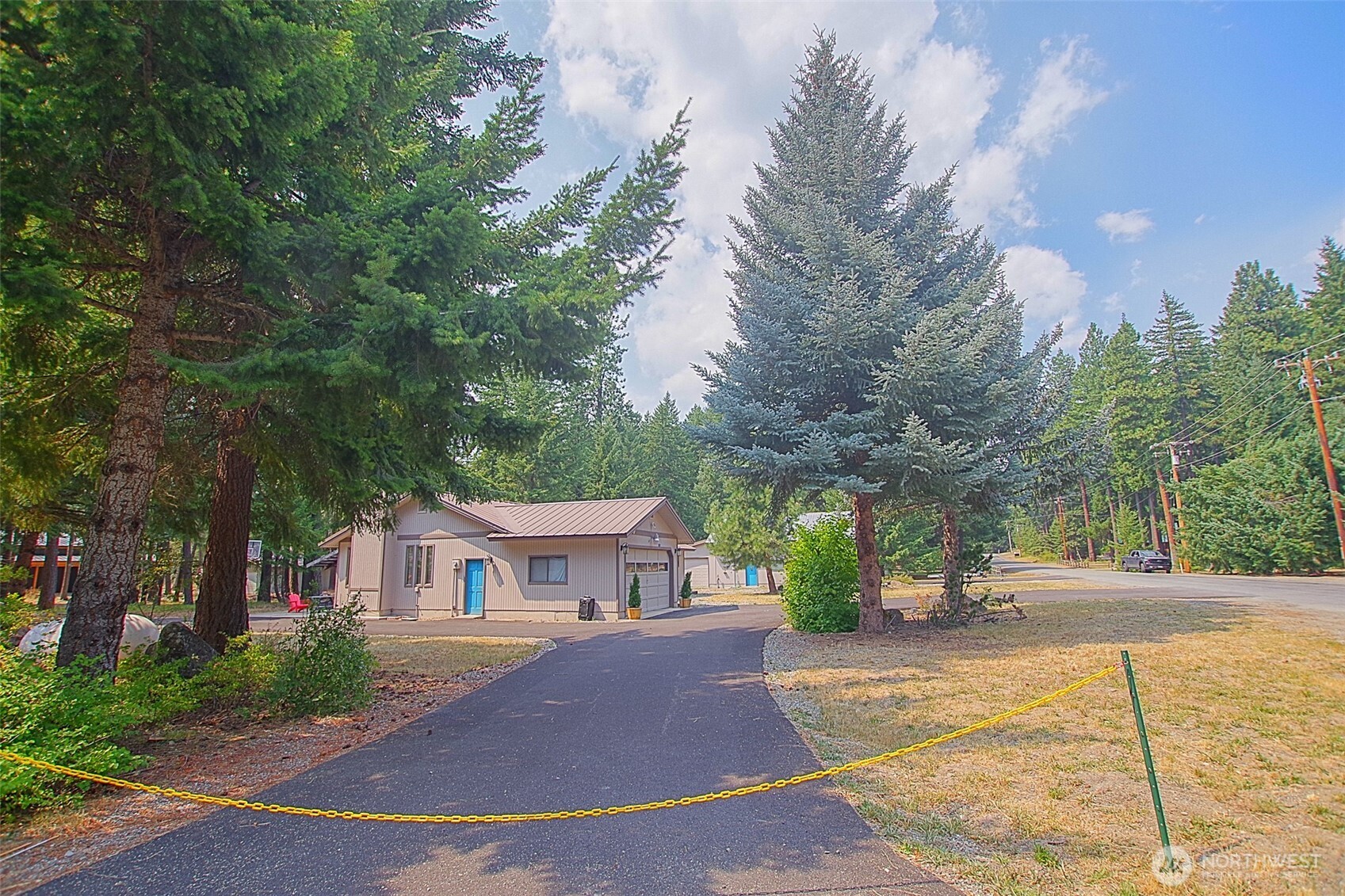 70 Lake Cabins Road Ronald, WA 98940 - Photo 29 of 32 a front view of a house with a yard