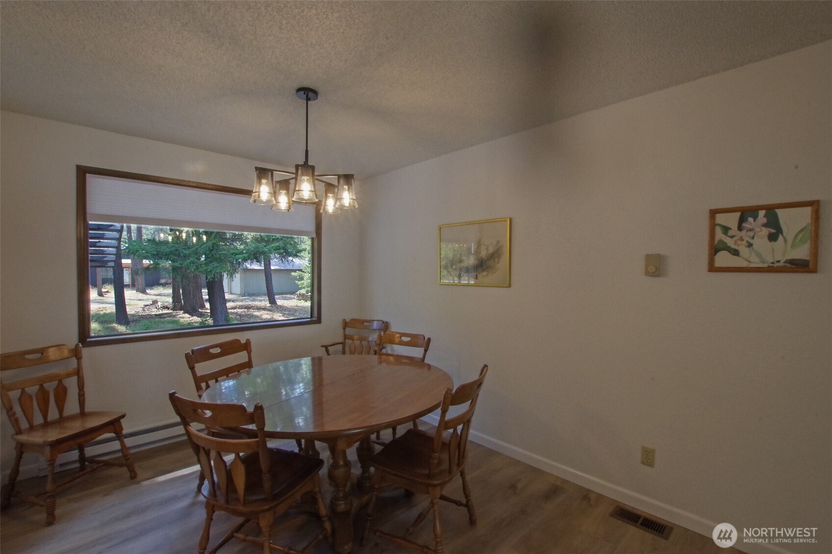 70 Lake Cabins Road Ronald, WA 98940 - Photo 4 of 32 a dining room with furniture a chandelier and window