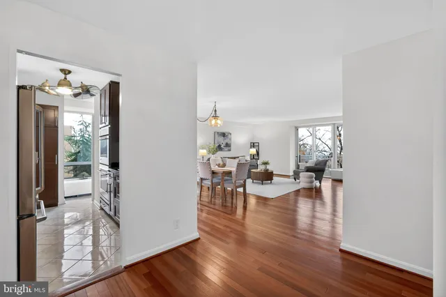 a view of a living room and dining room