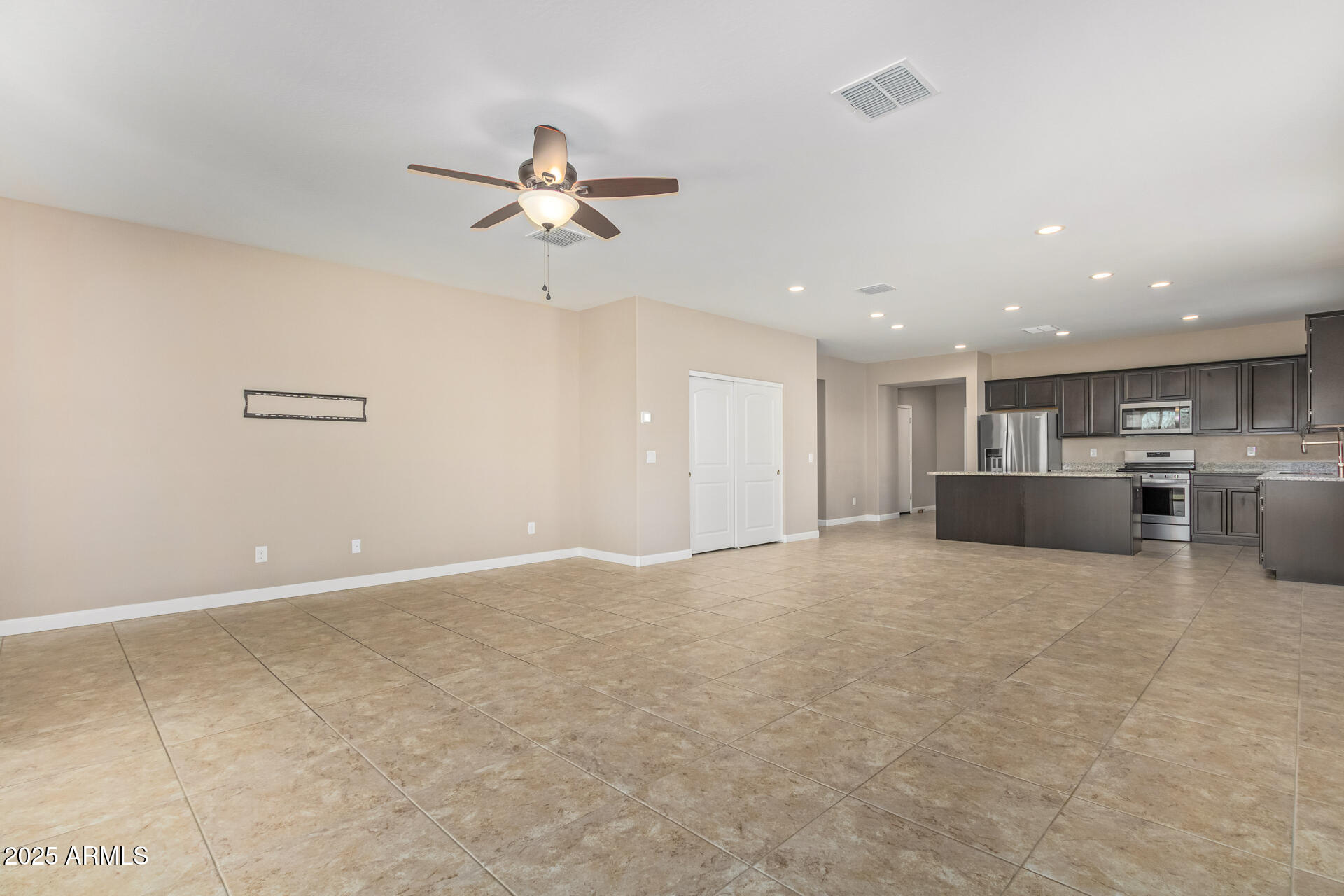 29421 West Mitchell Avenue Buckeye, AZ 85396 - Photo 10 of 40 a view of a kitchen with a sink and cabinet