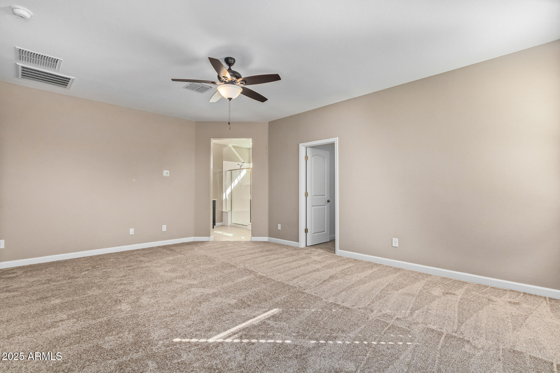 29421 West Mitchell Avenue Buckeye, AZ 85396 - Photo 15 of 40 a view of an empty room