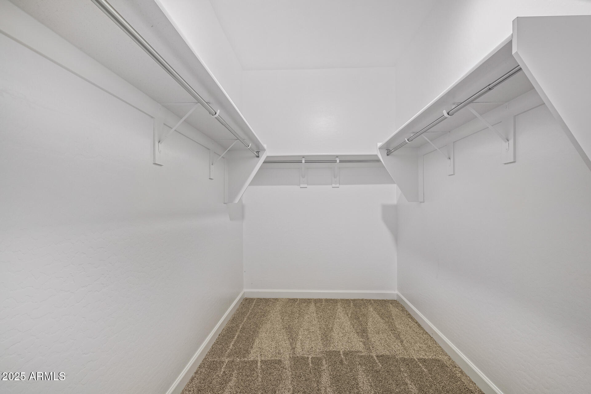 29421 West Mitchell Avenue Buckeye, AZ 85396 - Photo 18 of 40 a view of an empty room