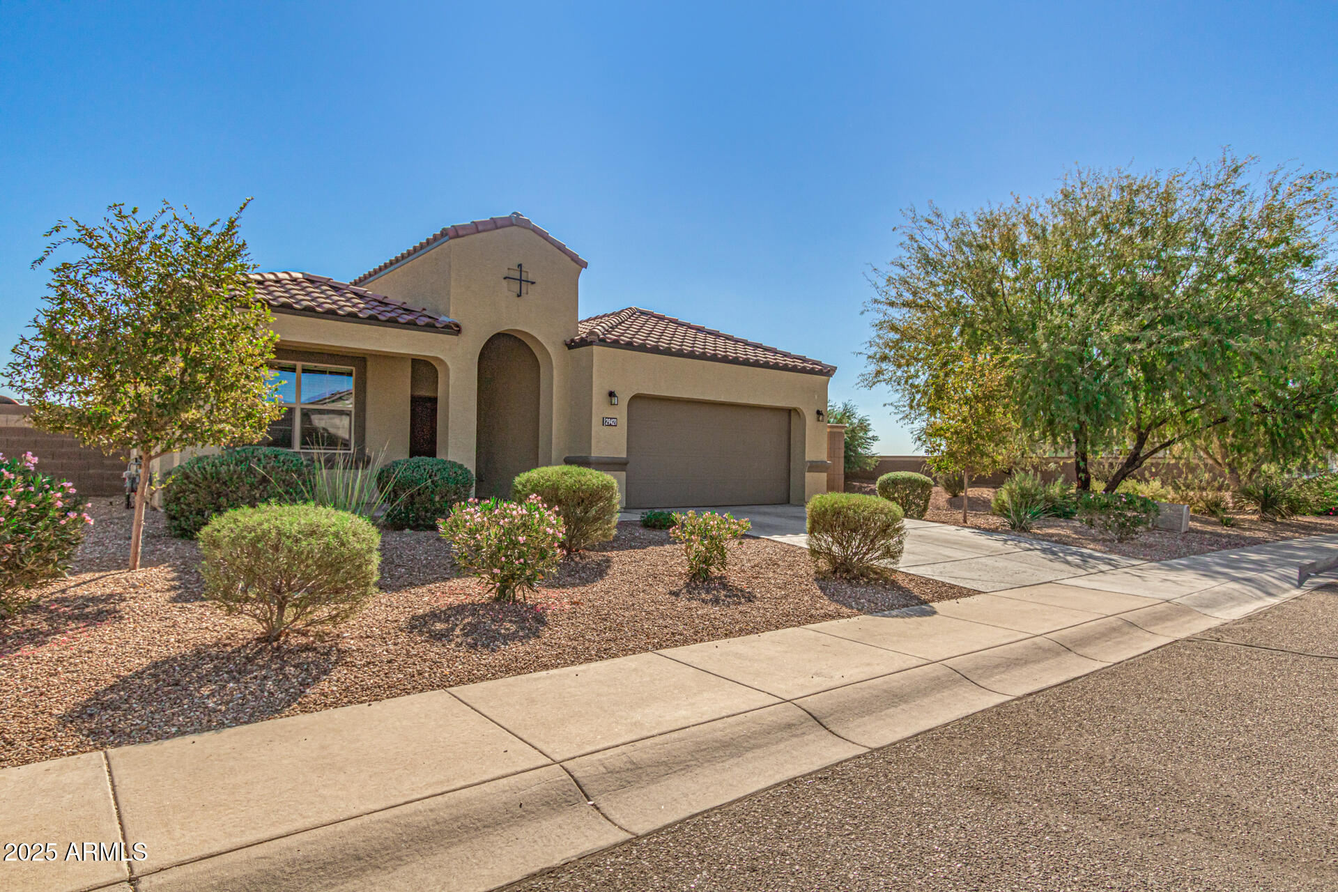 29421 West Mitchell Avenue Buckeye, AZ 85396 - Photo 2 of 40 a front view of a house with sitting area