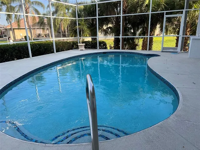 a view of a swimming pool with a sink