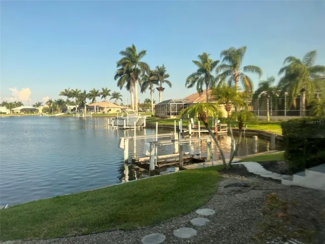 a view of a lake with a big yard