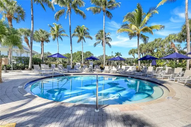 an aerial view of beach and city