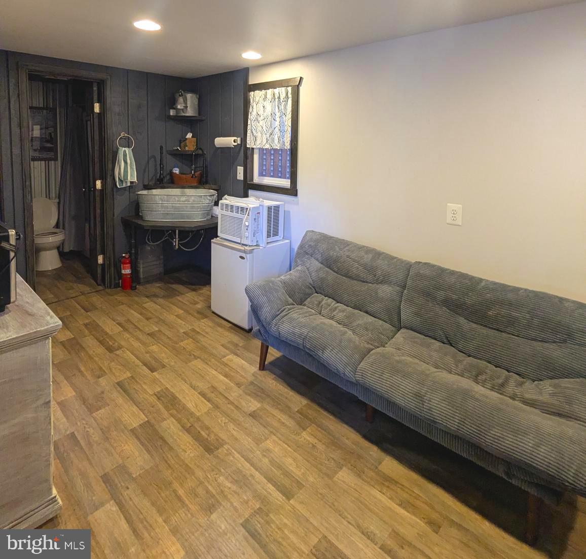 4 Butterfly Boulevard Falling Waters, WV 25419 - Photo 13 of 17 a living room with furniture and a couch