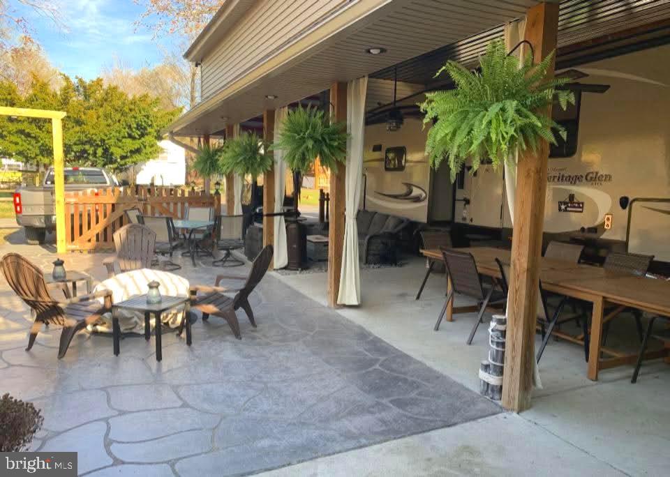 4 Butterfly Boulevard Falling Waters, WV 25419 - Photo 2 of 17 a view of outdoor dining space with a patio