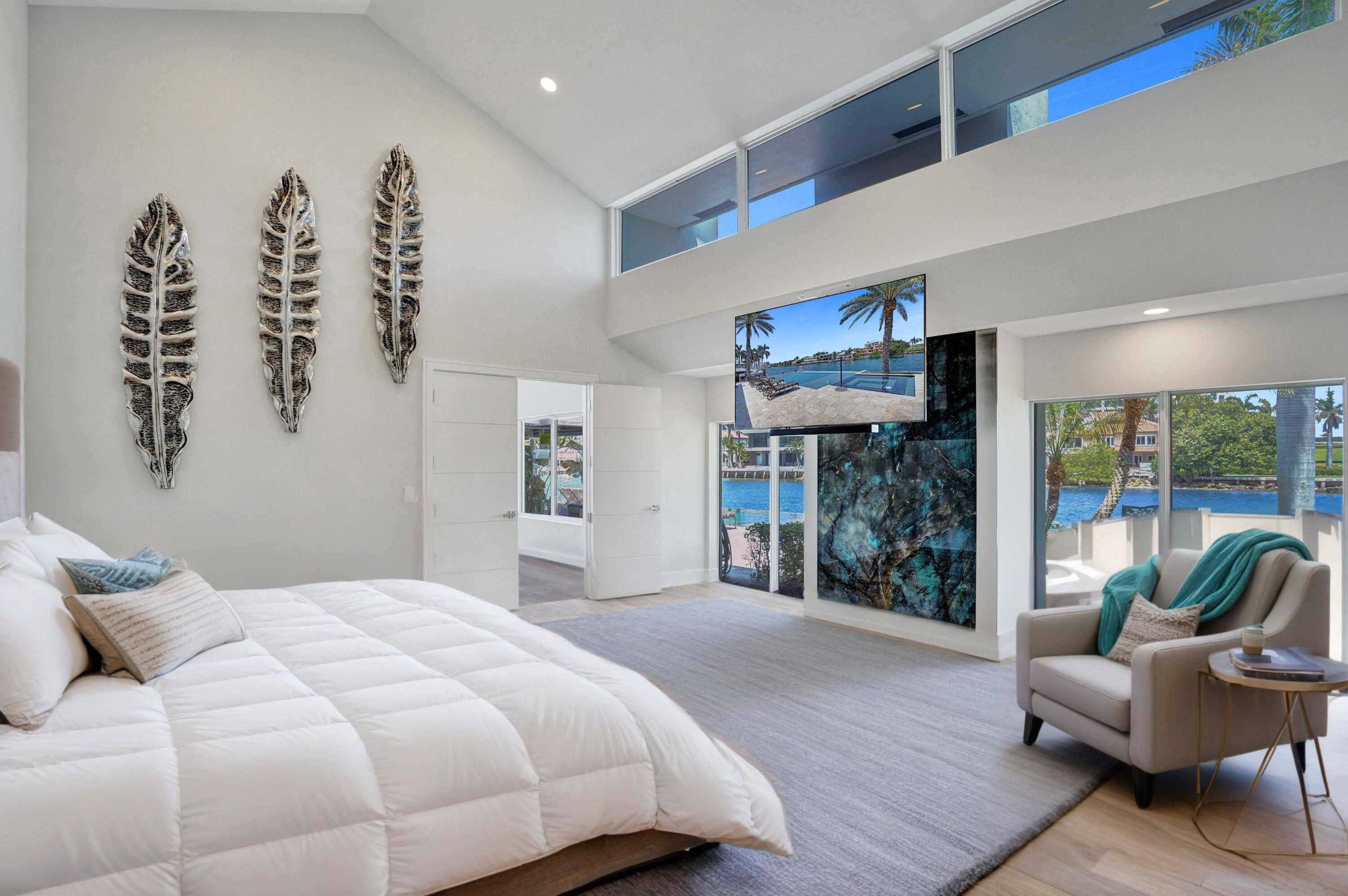 961 Iris Drive Delray Beach, FL 33483 - Photo 12 of 59 a bedroom with furniture and a large window