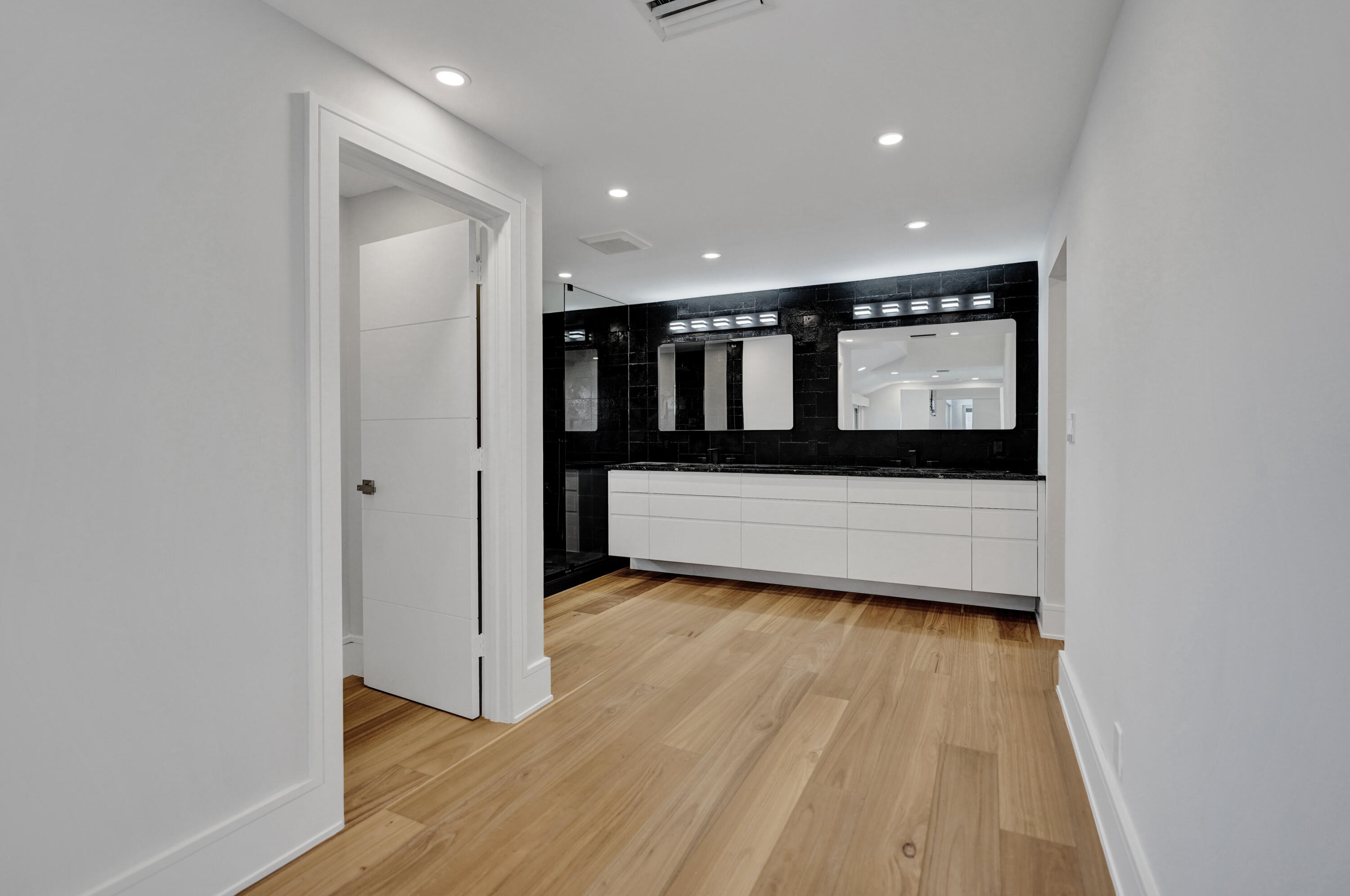961 Iris Drive Delray Beach, FL 33483 - Photo 15 of 59 a view of wooden floor and a hallway