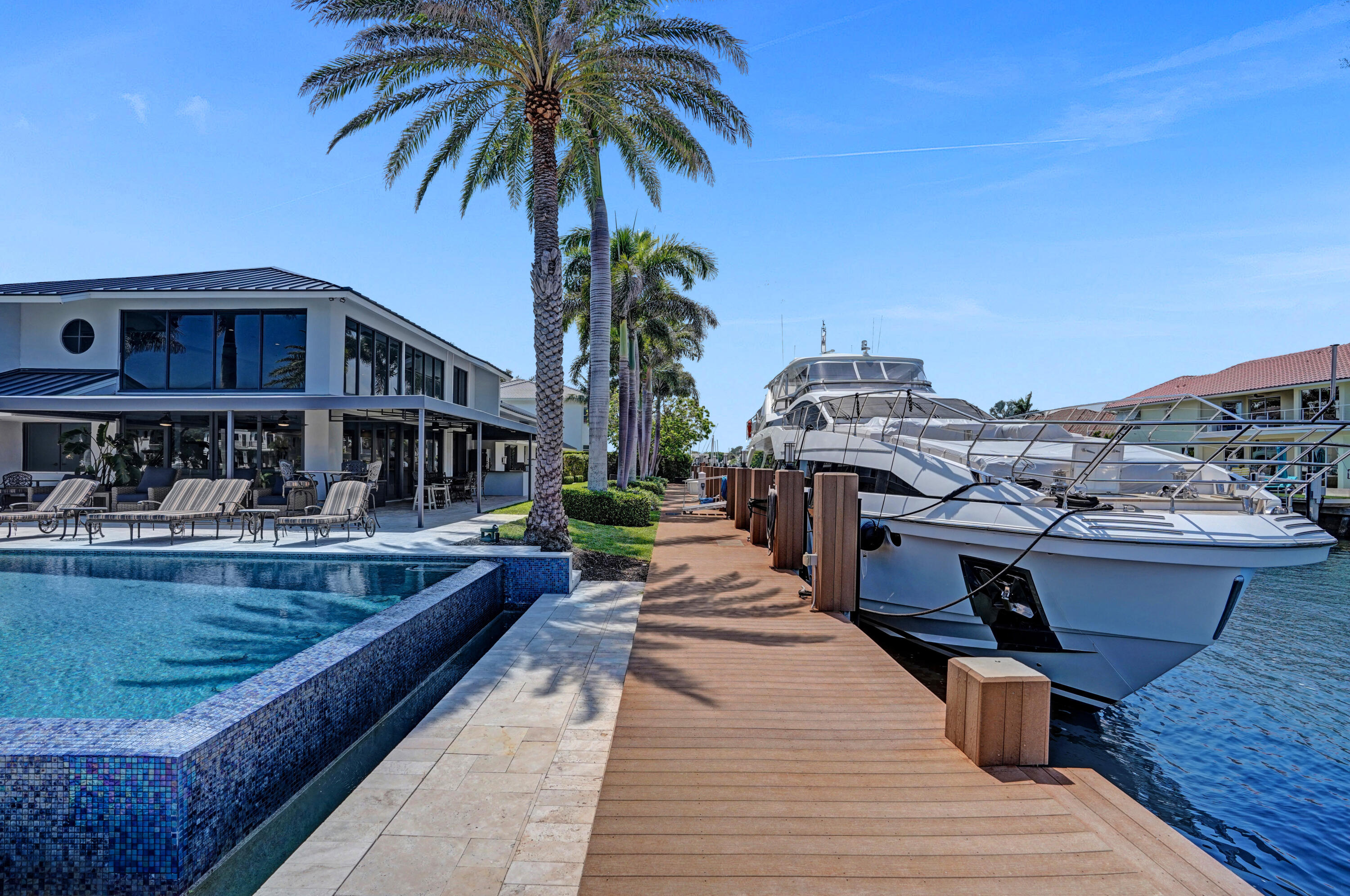 961 Iris Drive Delray Beach, FL 33483 - Photo 45 of 59 a view of a house with swimming pool