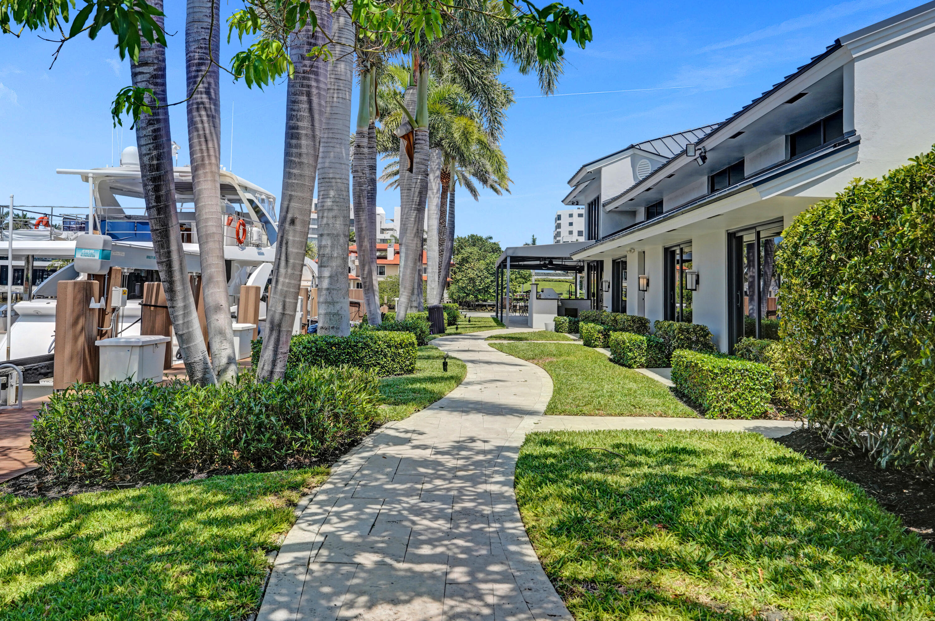 961 Iris Drive Delray Beach, FL 33483 - Photo 49 of 59 a view of a back yard of the house