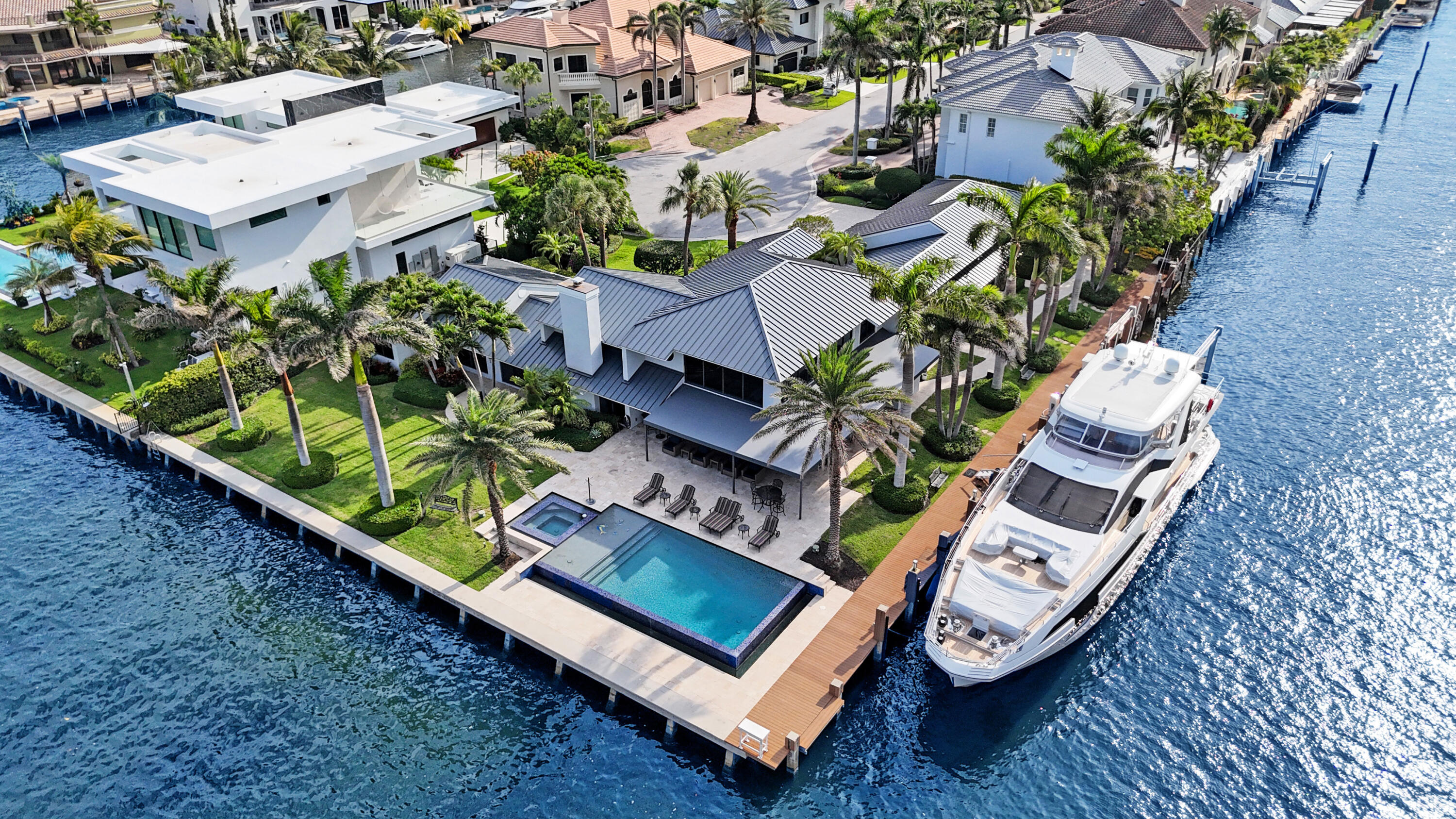 961 Iris Drive Delray Beach, FL 33483 - Photo 52 of 59 an aerial view of a house with garden space and sitting area
