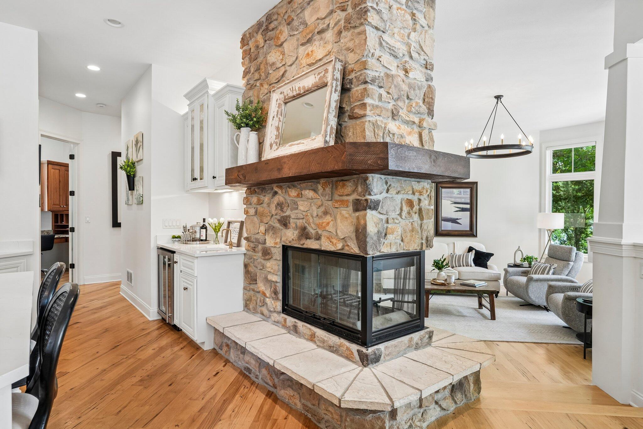 W343N6293 South Bayview Road Oconomowoc, WI 53066 - Photo 40 of 104 Two sided natural fireplace