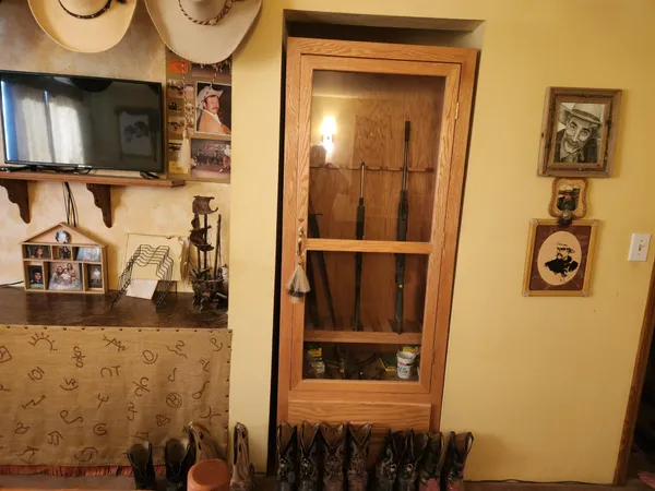 a bathroom with a sink mirror and vanity
