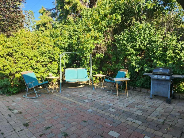 an outdoor space with furniture