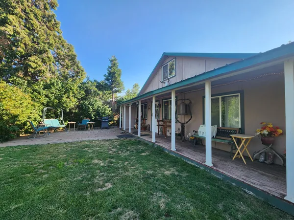 a view of outdoor space with a kitchen
