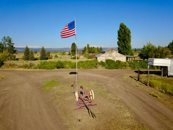 a view of a lake with couches and city view