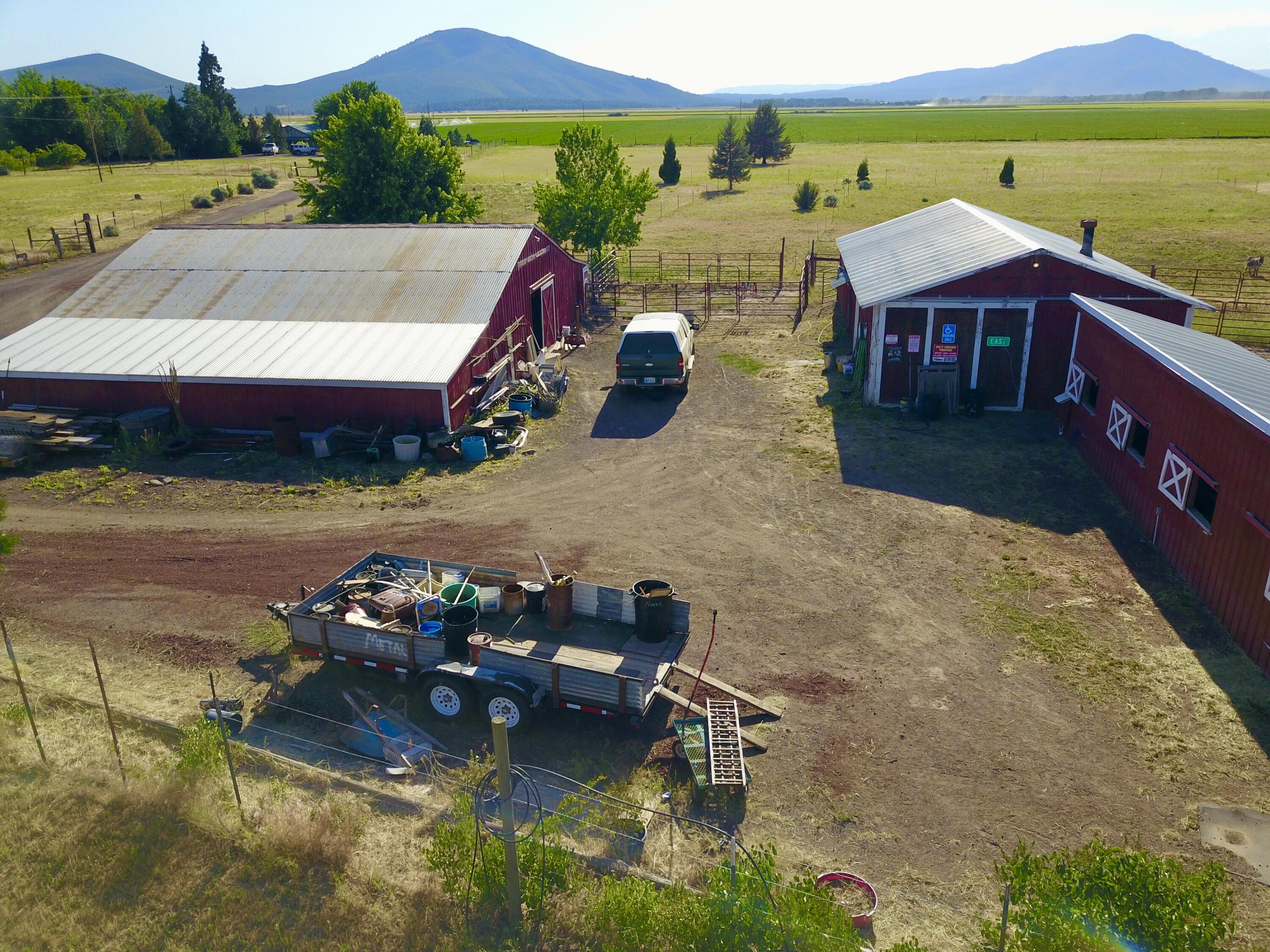 25965 Cir Bell Road Fall River Mills, CA 96028 - Photo 8 of 53 a view of a lake with couches and city view