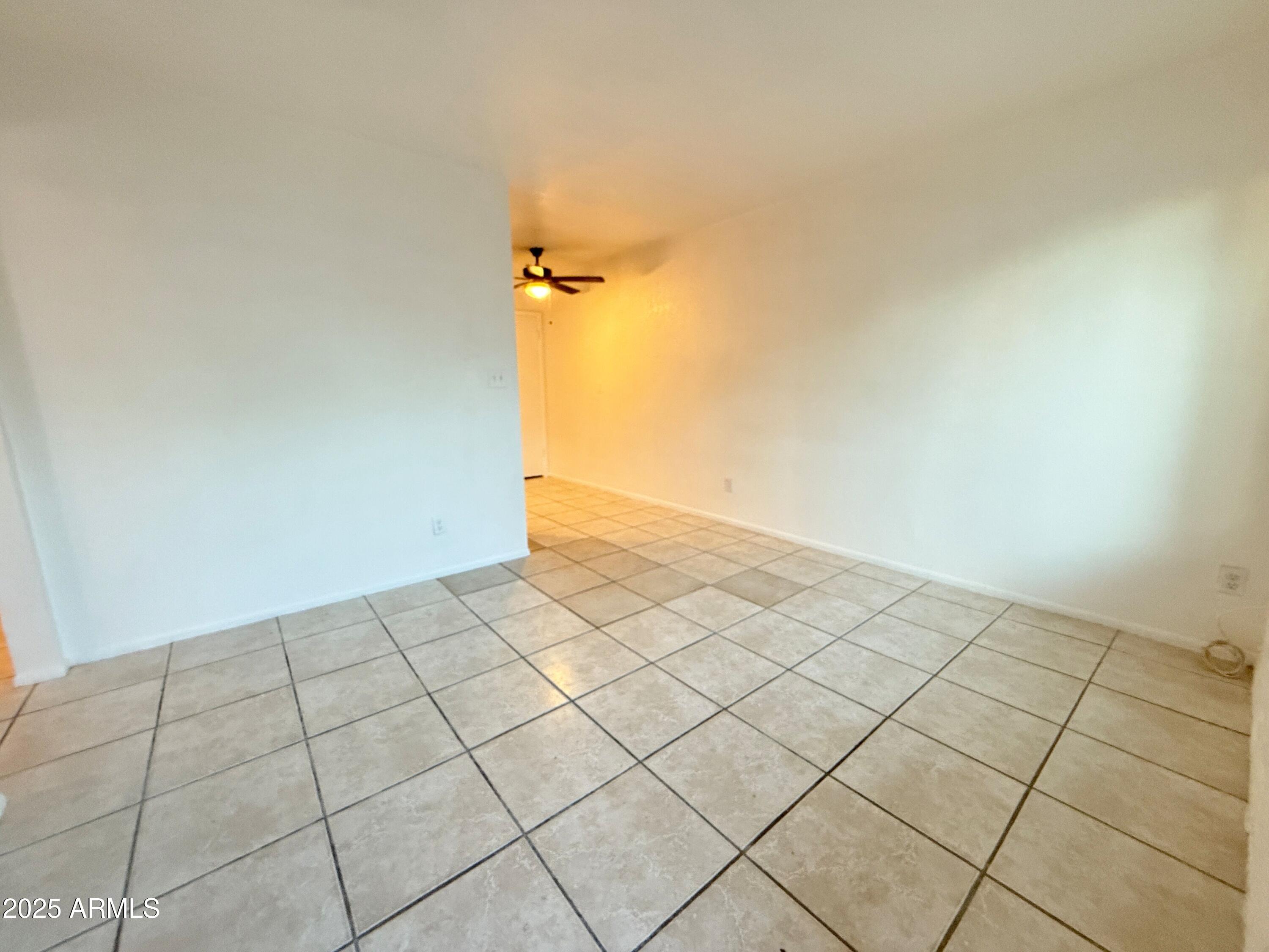 3125 North 66th Street, Unit 2 Scottsdale, AZ 85251 - Photo 4 of 10 a view of a room and has a rug